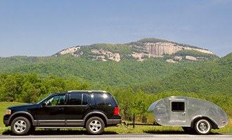 10 SUVs That Can Tow a Travel Trailer or Fifth Wheel